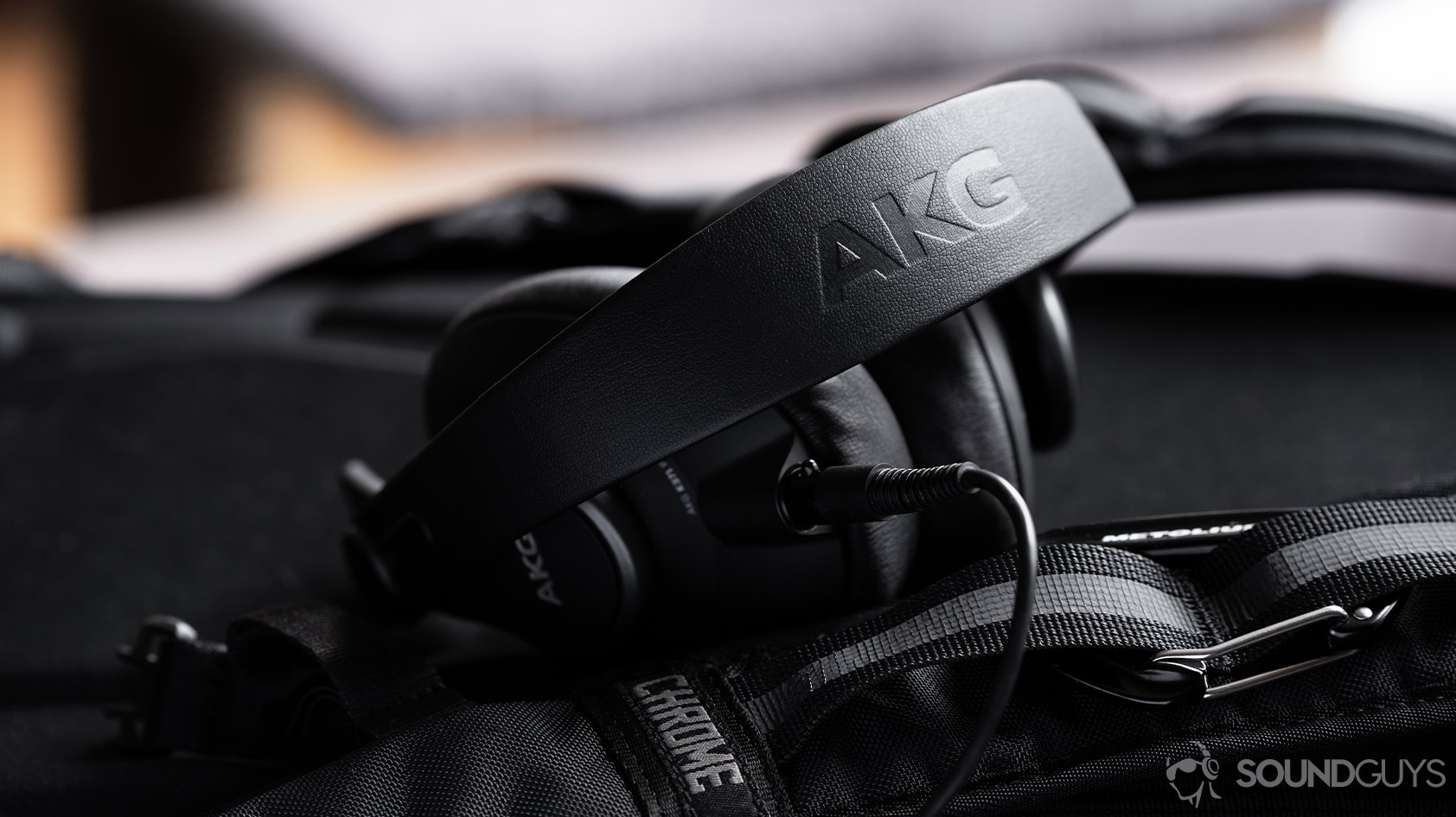 AKG K371-over ear wired headphones headband A picture of the AKG K371 wired over-ear headphones with the AKG headband in focus.