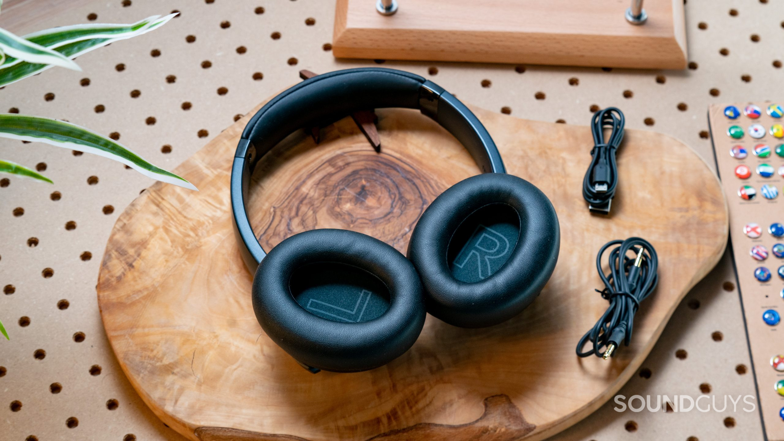 Anker Soundcore Life Q20 ear pads full The Anker Soundcore Life Q20 headset in full with the ear cups facing upward while resting on a wood surface.