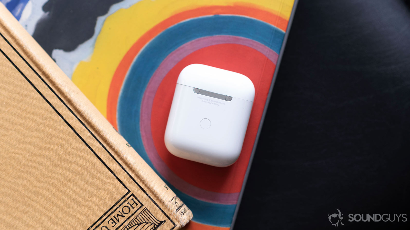 Apple new AirPods 2_aerial case AirPods 2 top-down image of the case showing the new hinge.