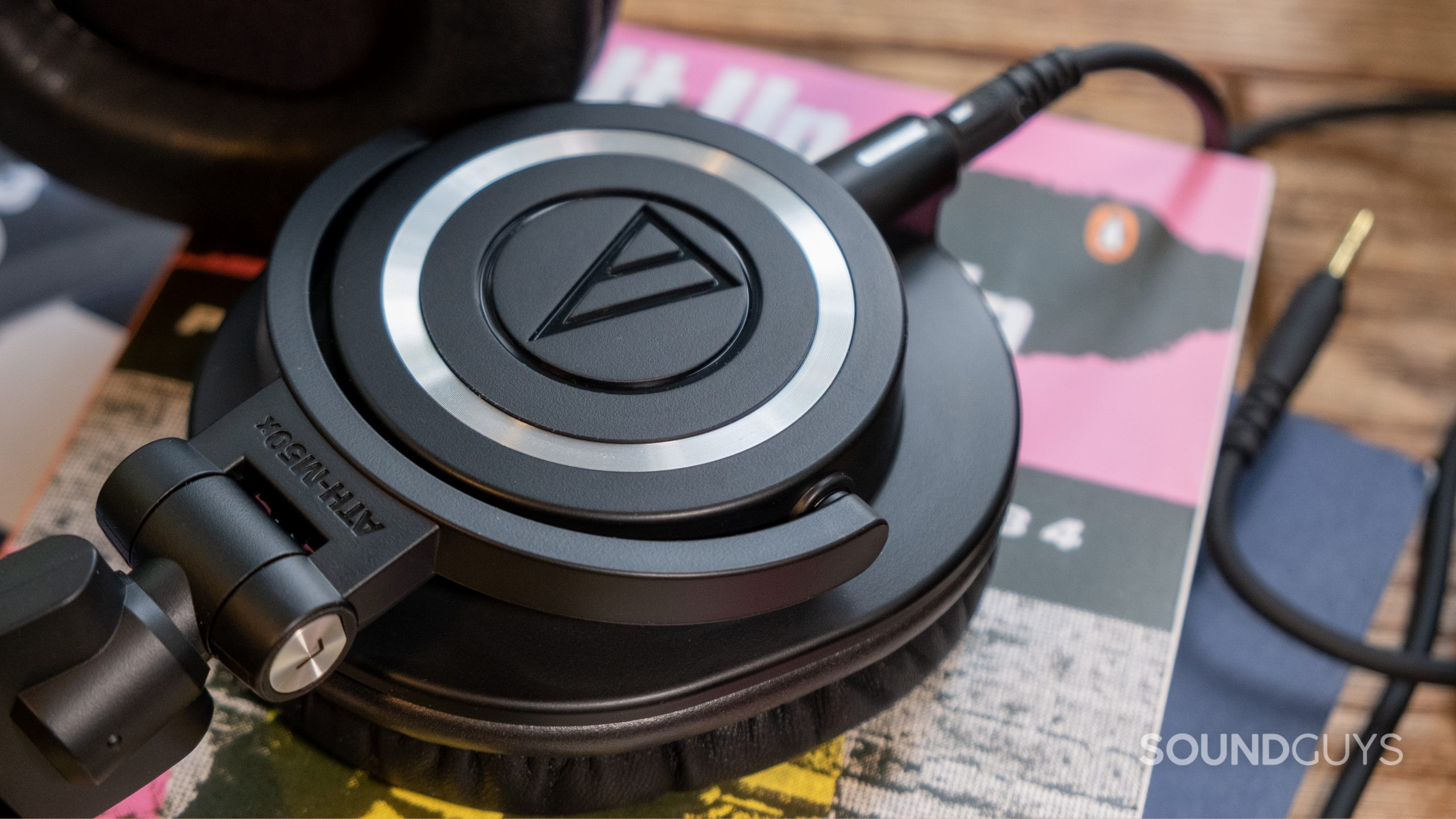 audio-technica-ath-m50x-ear-cup-close-up A close up of the Audio-Technica ATH-M50x shows the connection point of the cable.