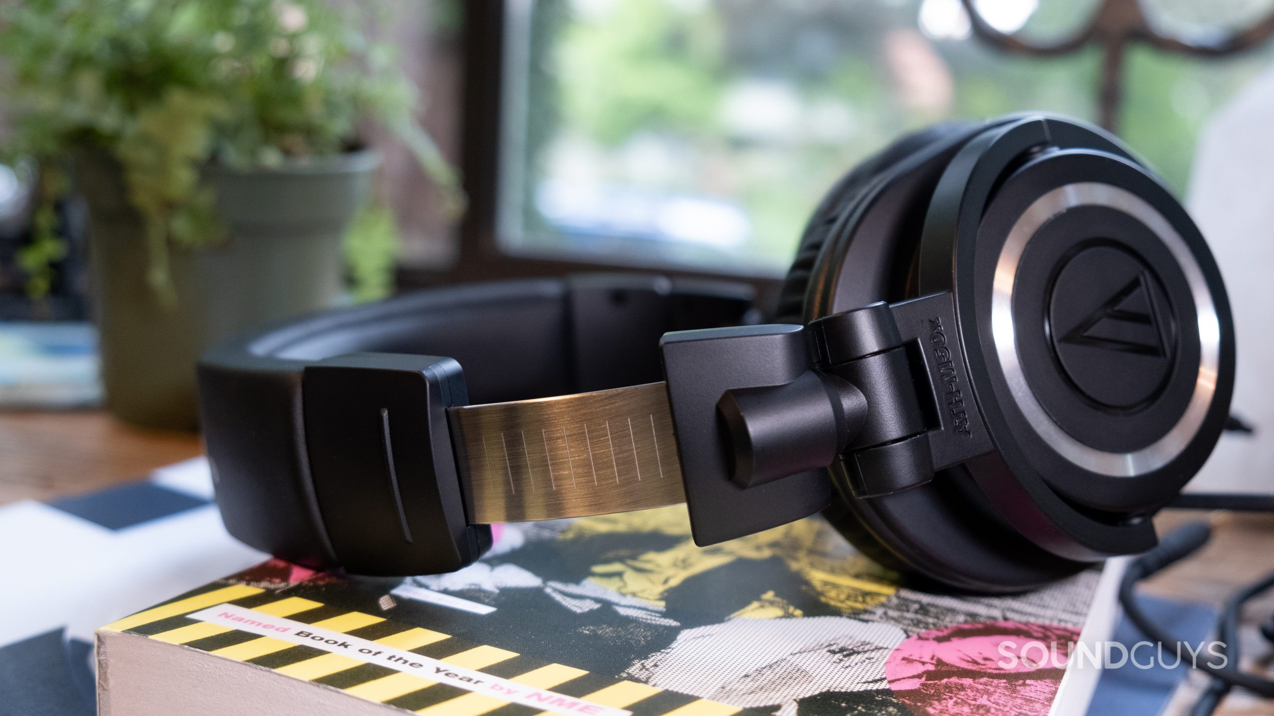 audio-technica-ath-m50x-side The Audio-Technica ATH-M50x from the side with the headband expanded to show the metal notches.