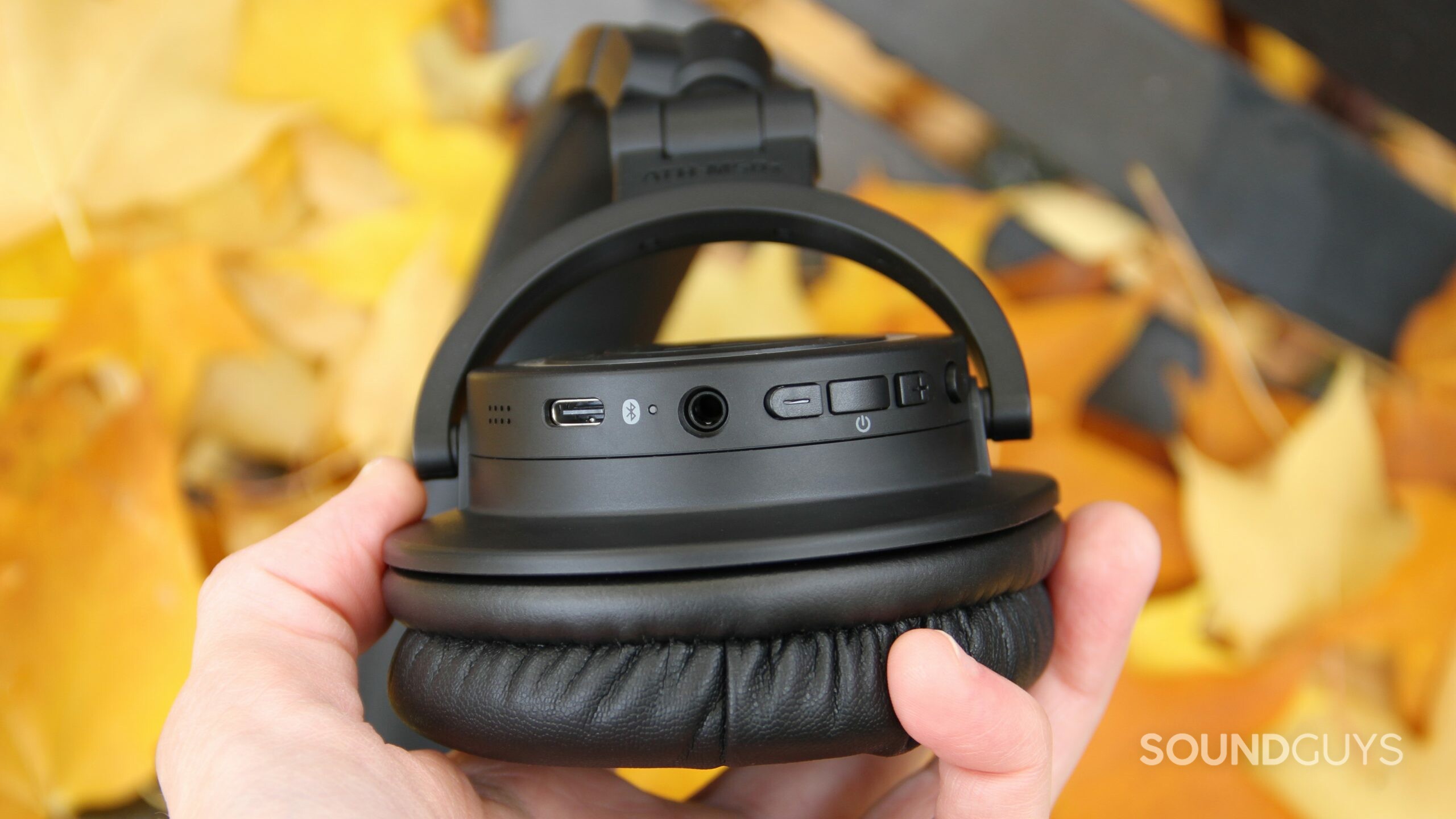 audio-technica-ath-m50xbt2-buttons Close up of the buttons and connections on Audio-Technica ATH-M50xBT2 ear cup.