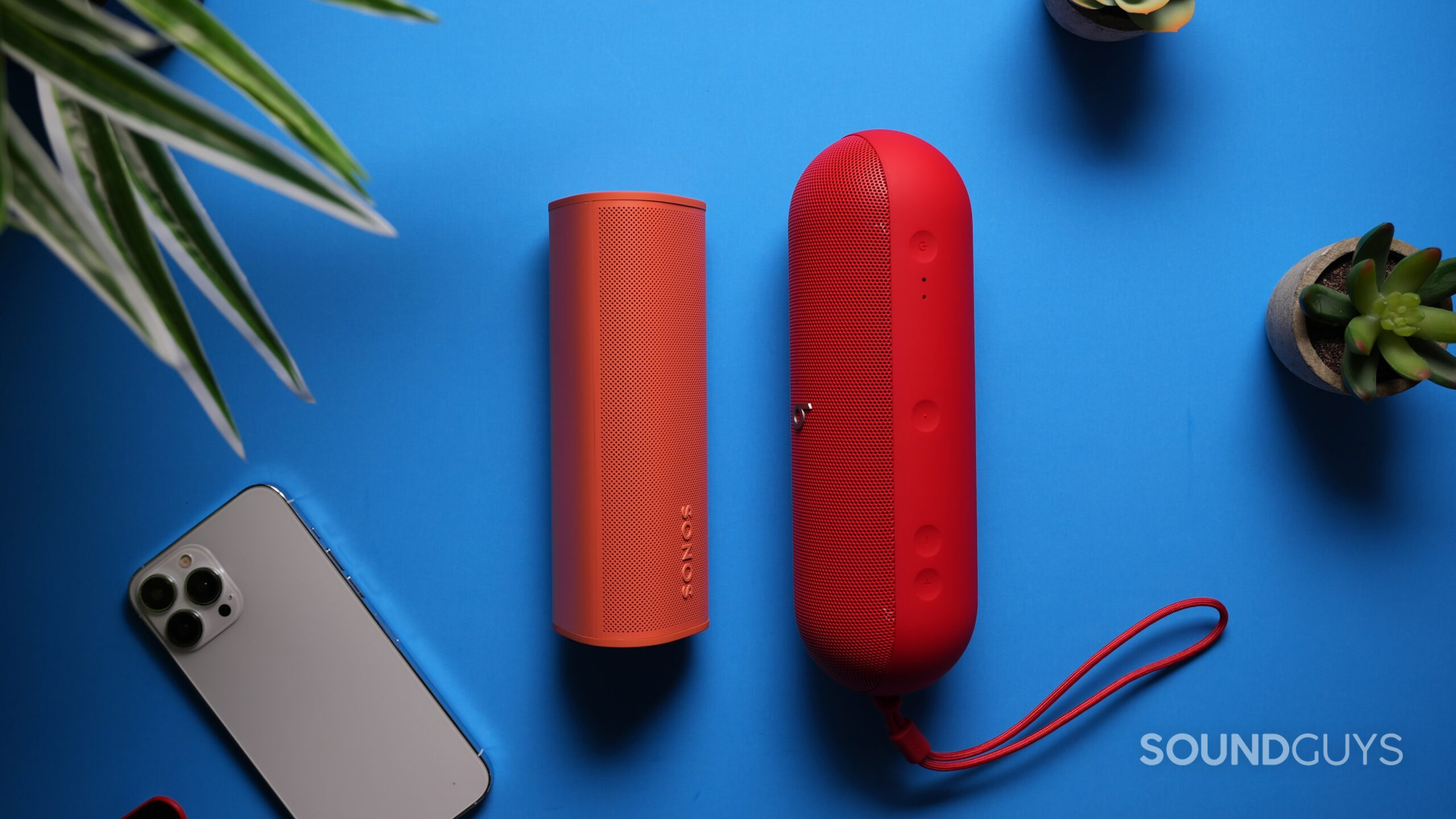 Beats Pill vs Roam 2 3 Top down shot of a Sonos Roam 2 lengthwise next to a Beats Pill