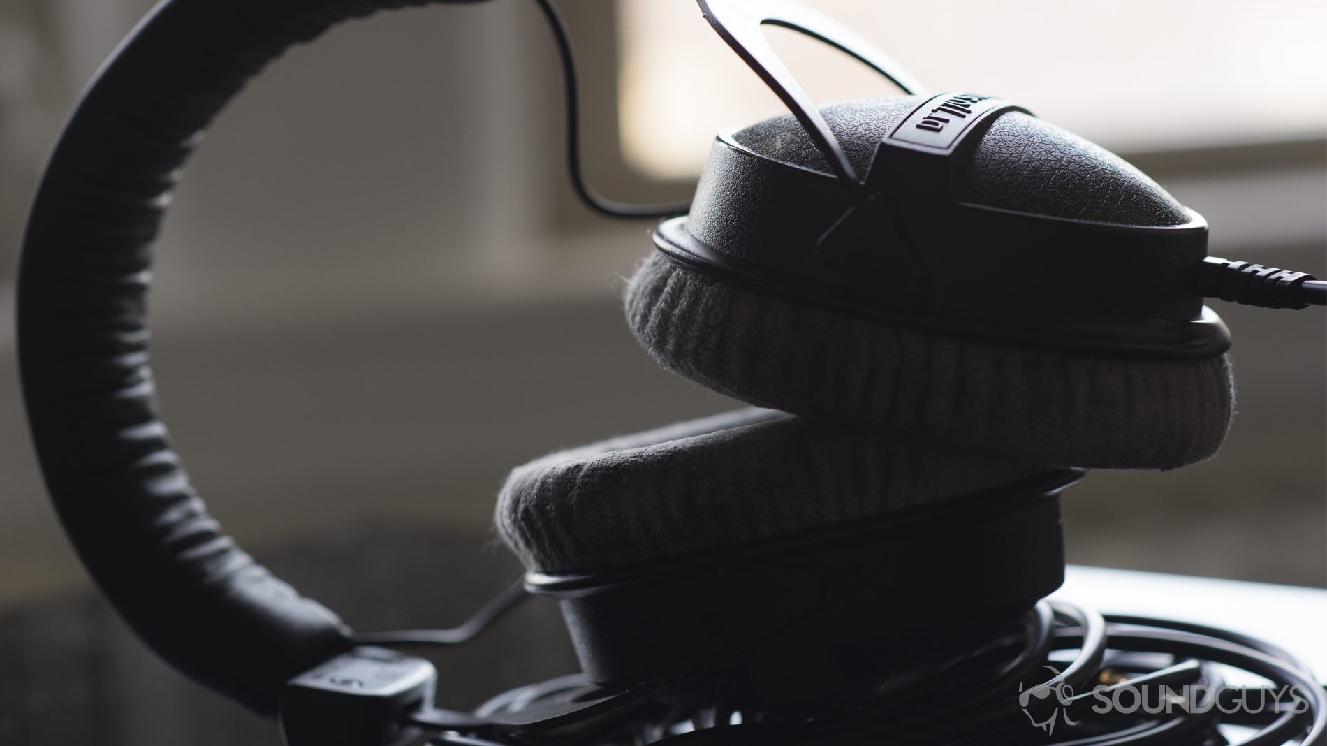 best-headphones-under-200-beyerdynamic-dt770-pro-table The Beyerdynamic DT 770 PRO 80Ohm backlit by a window.