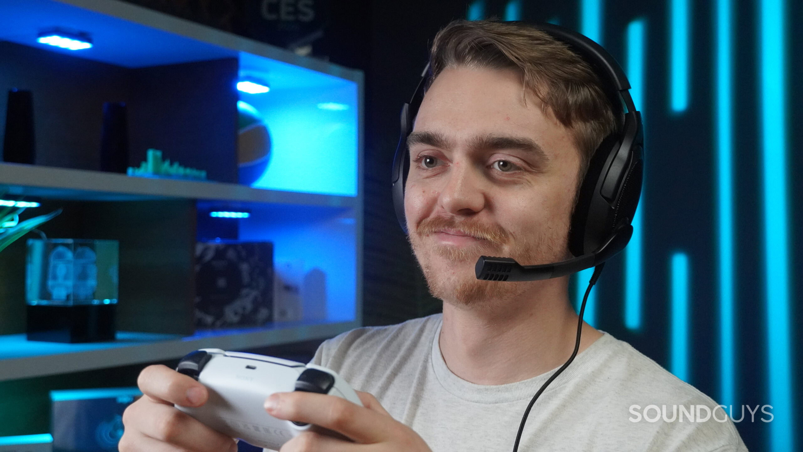 birney gaming smiling a handsome man playing video games