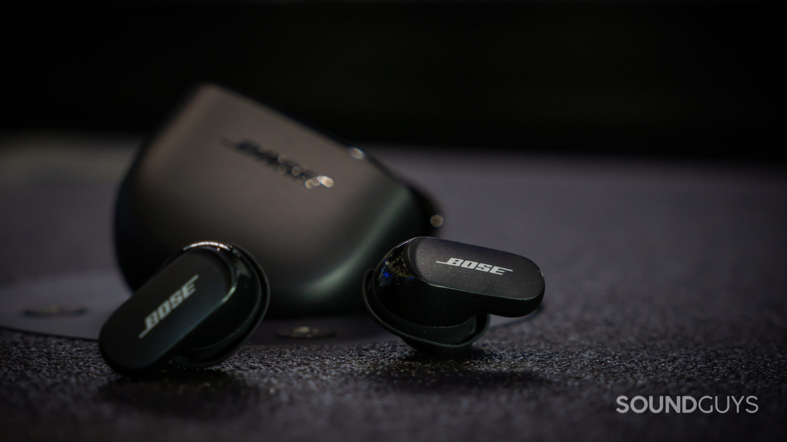 Bose QuietComfort Earbuds II true wireless noise canceling earbuds case full-2 The Bose QuietComfort Earbuds II with the earbuds outside of the angled case.