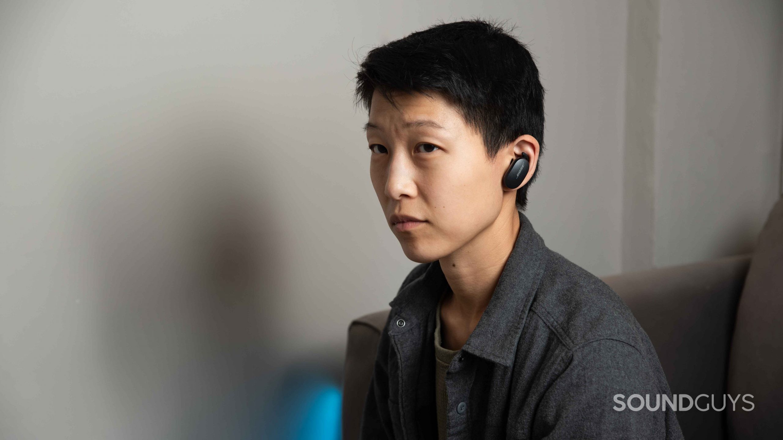 Bose QuietComfort Earbuds noise canceling true wireless-7 A woman wears the Bose QuietComfort Earbuds noise canceling true wireless earbuds.