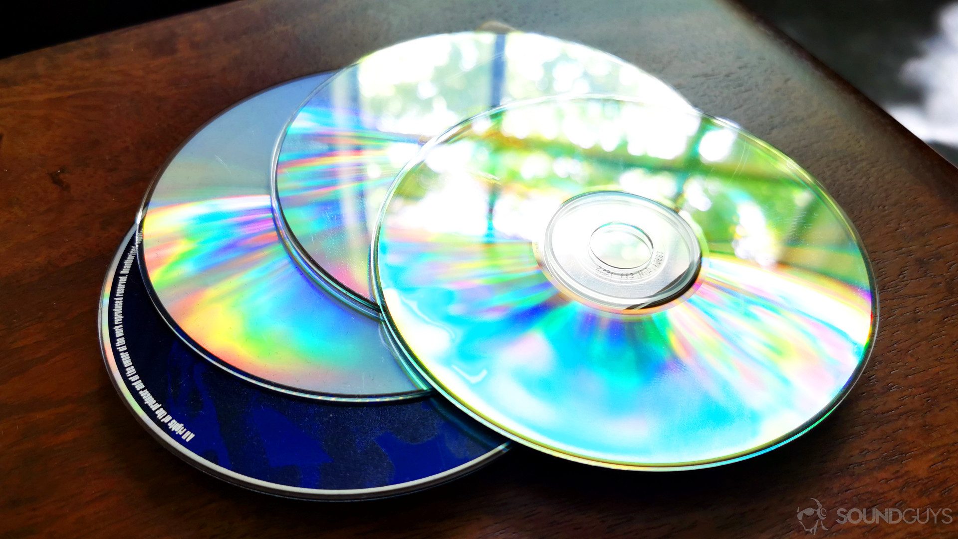 CD dithering CDs on a table.