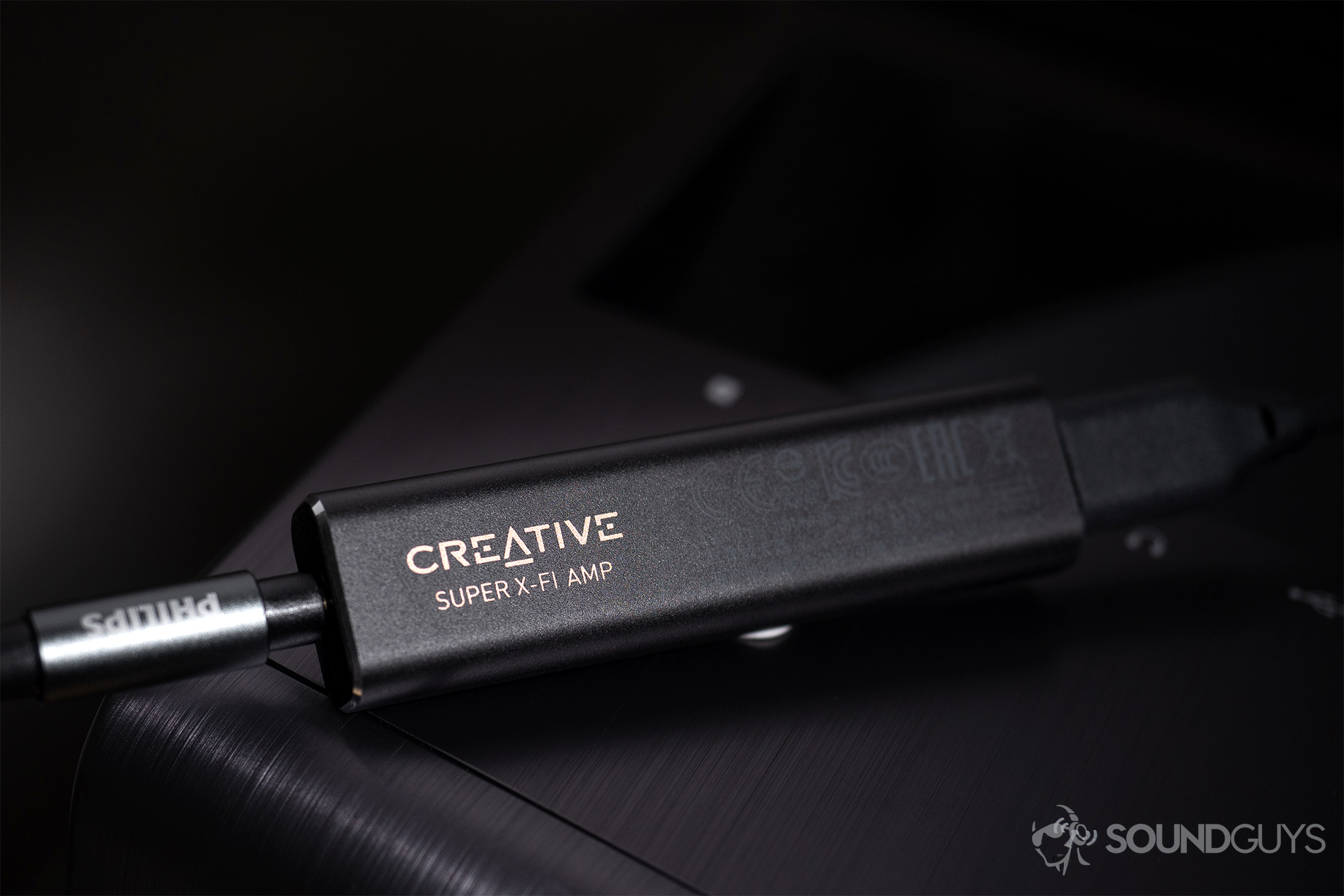 Creative_Super X-Fi-4 Creative Super X-Fi Amp: The amp on an HP Omen desktop computer.