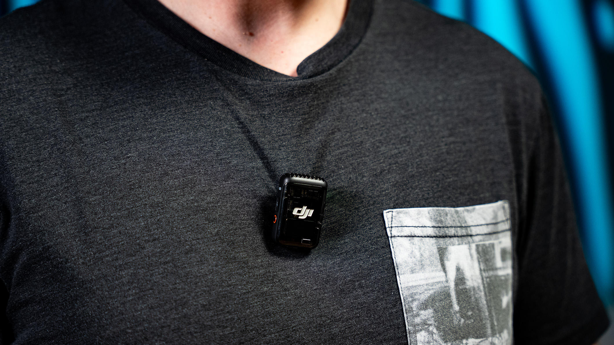 DJI Mic 2 on shirt blue background