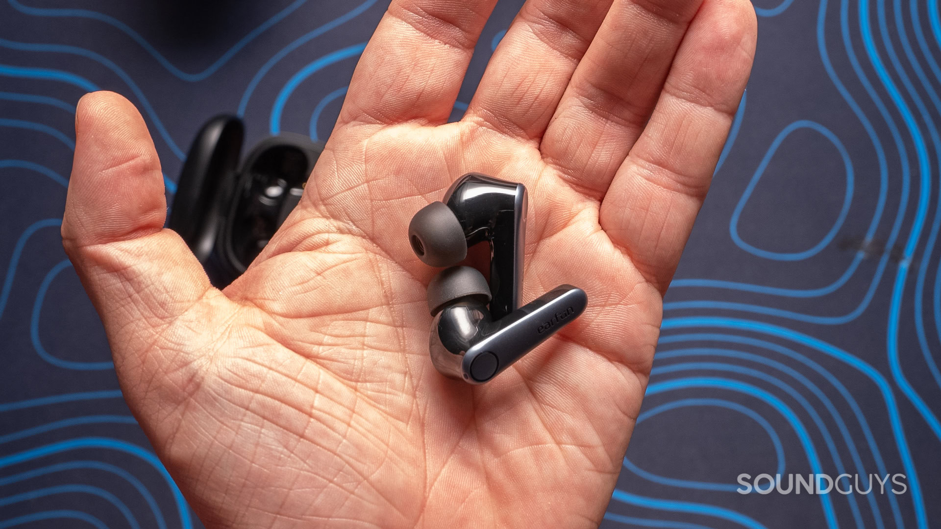 earfun-air-pro-3-buds A photo of the EarFun Air Pro 3 earbuds in someone's hand.