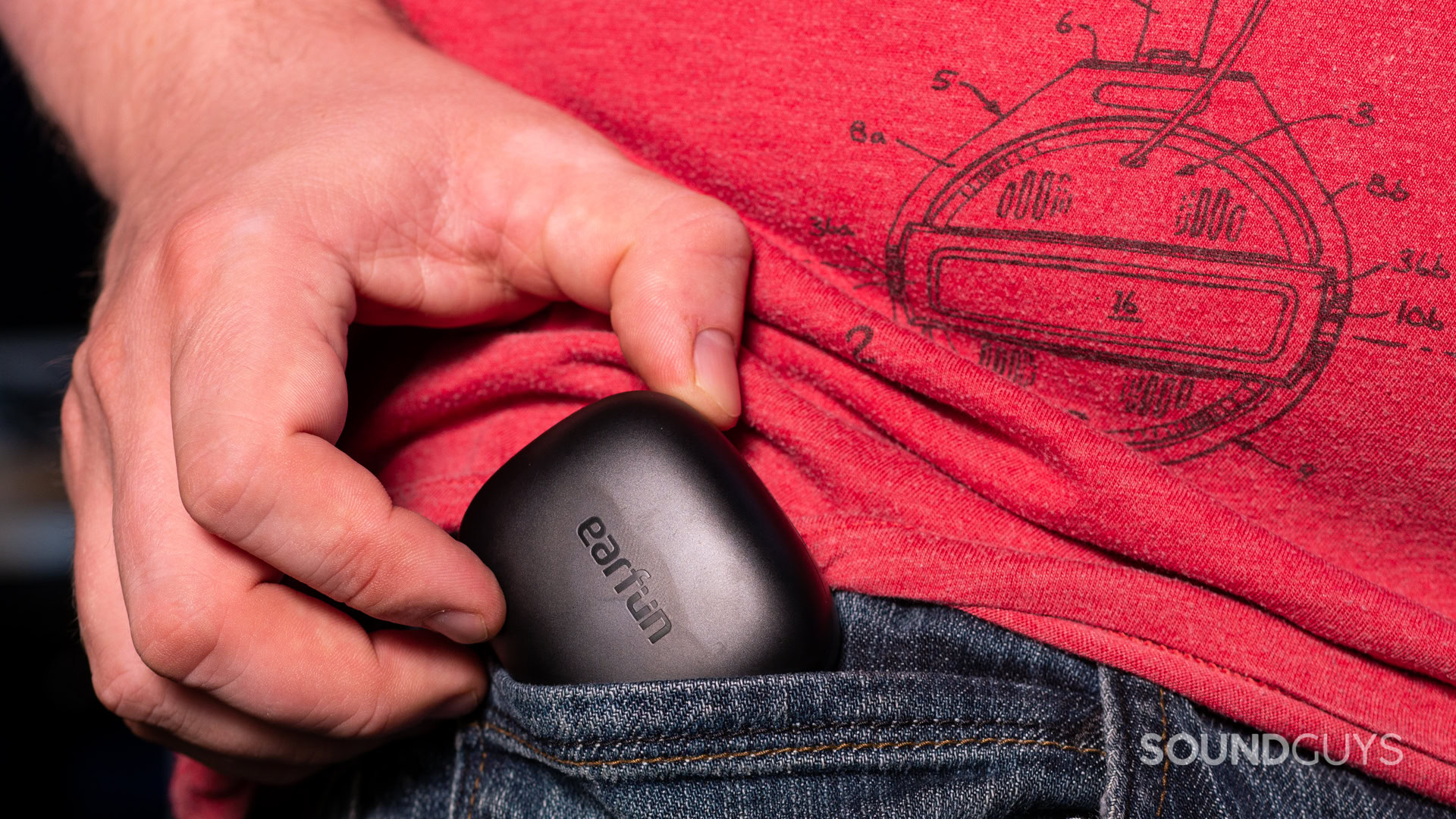 earfun-air-pro-3-portability A photo of the EarFun Air Pro 3 being stuffed into a man's jeans pocket.