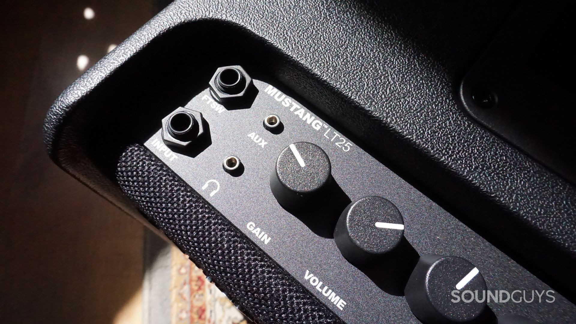 Fender-Mustang-LT25-headphone-and-aux-ports The Fender Mustang LT25 has an aux input so you can play along with your favorite songs