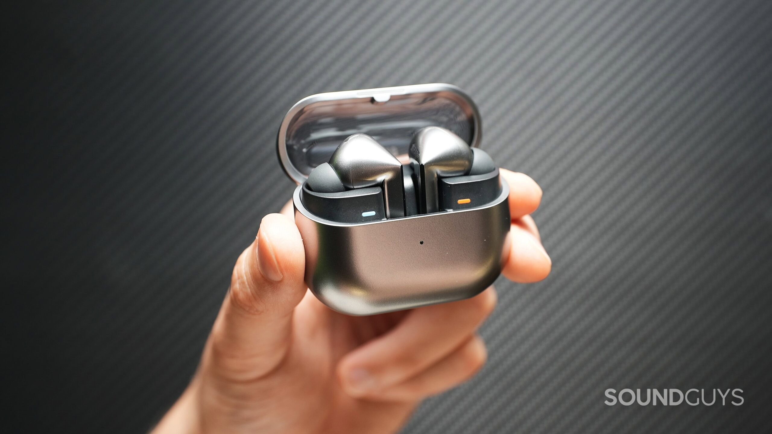 Galaxy Buds3 Pro in hand Galaxy Buds3 Pro in hand