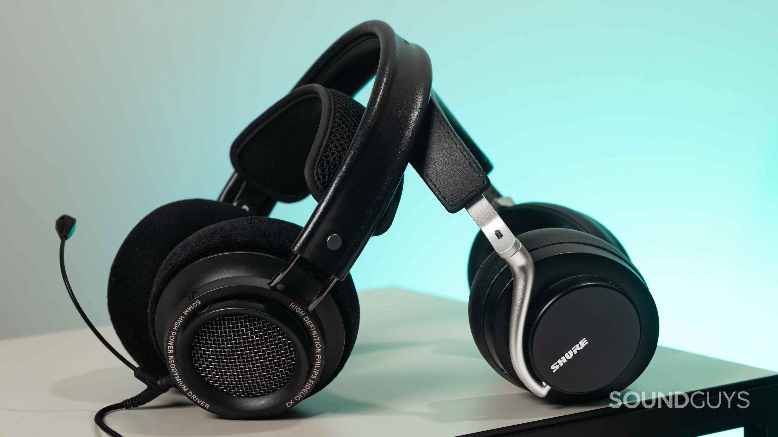 headphone buying guide over open back philips fidelio x2 shure aonic 50 anc The Philips Fidelio X2 open-back headphones lean against the Shure AONIC 50 Bluetooth headphones with noise canceling.