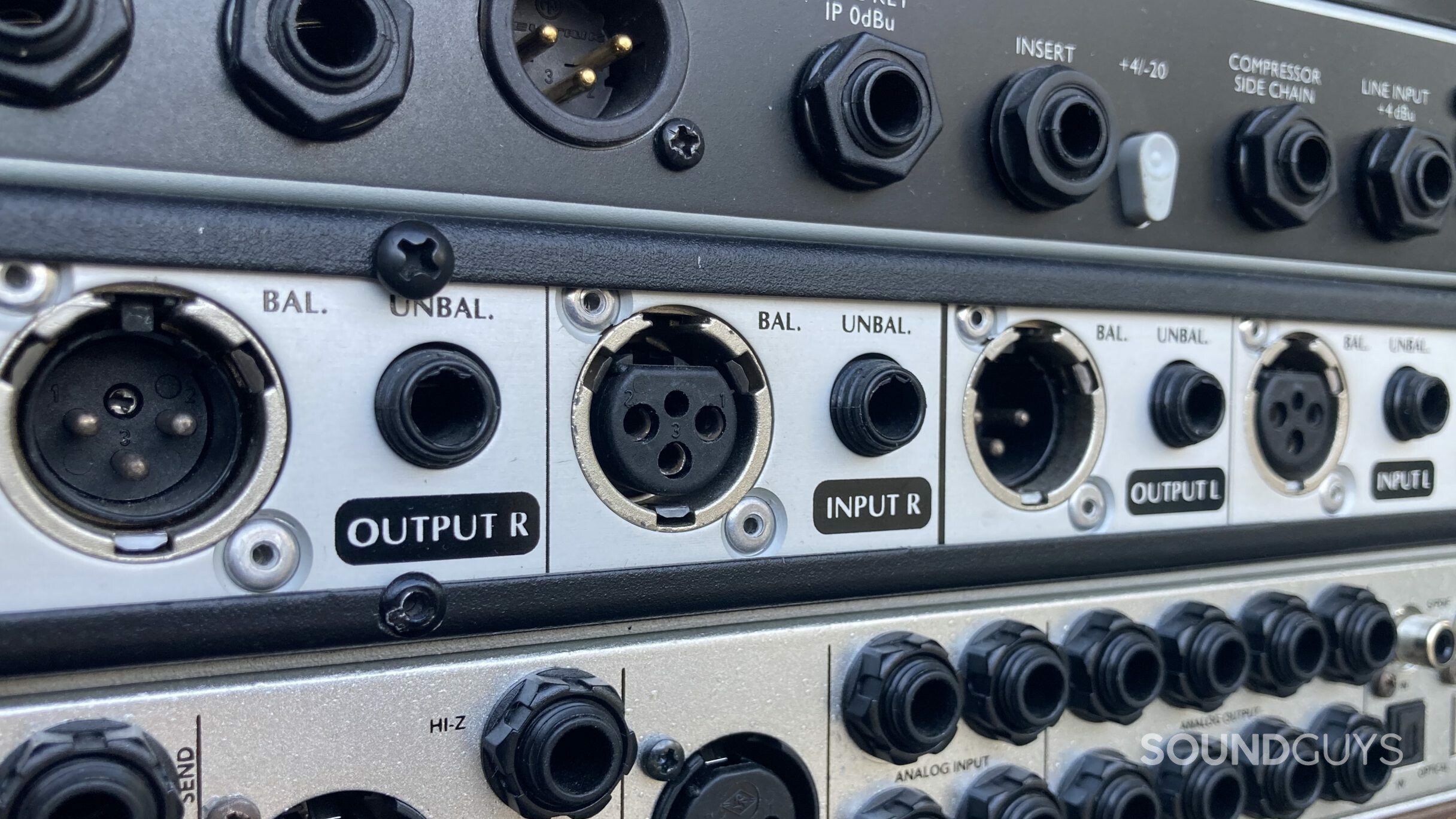 Input-Output-Panel The rear panel of various pieces of studio equipment showing jacks and XLR connectors with balanced and unbalanced designations.
