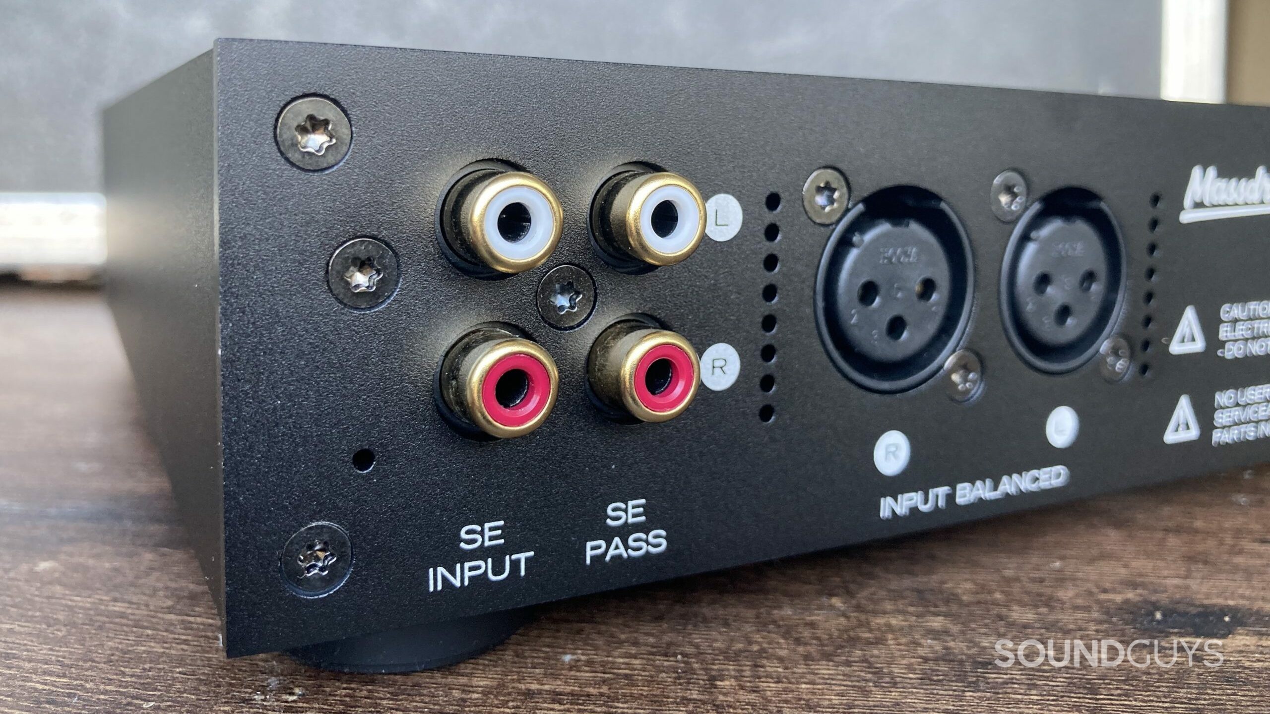THX-AAA-789-back The back panel of a headphone amplifier showing balanced and Single Ended input connectors.