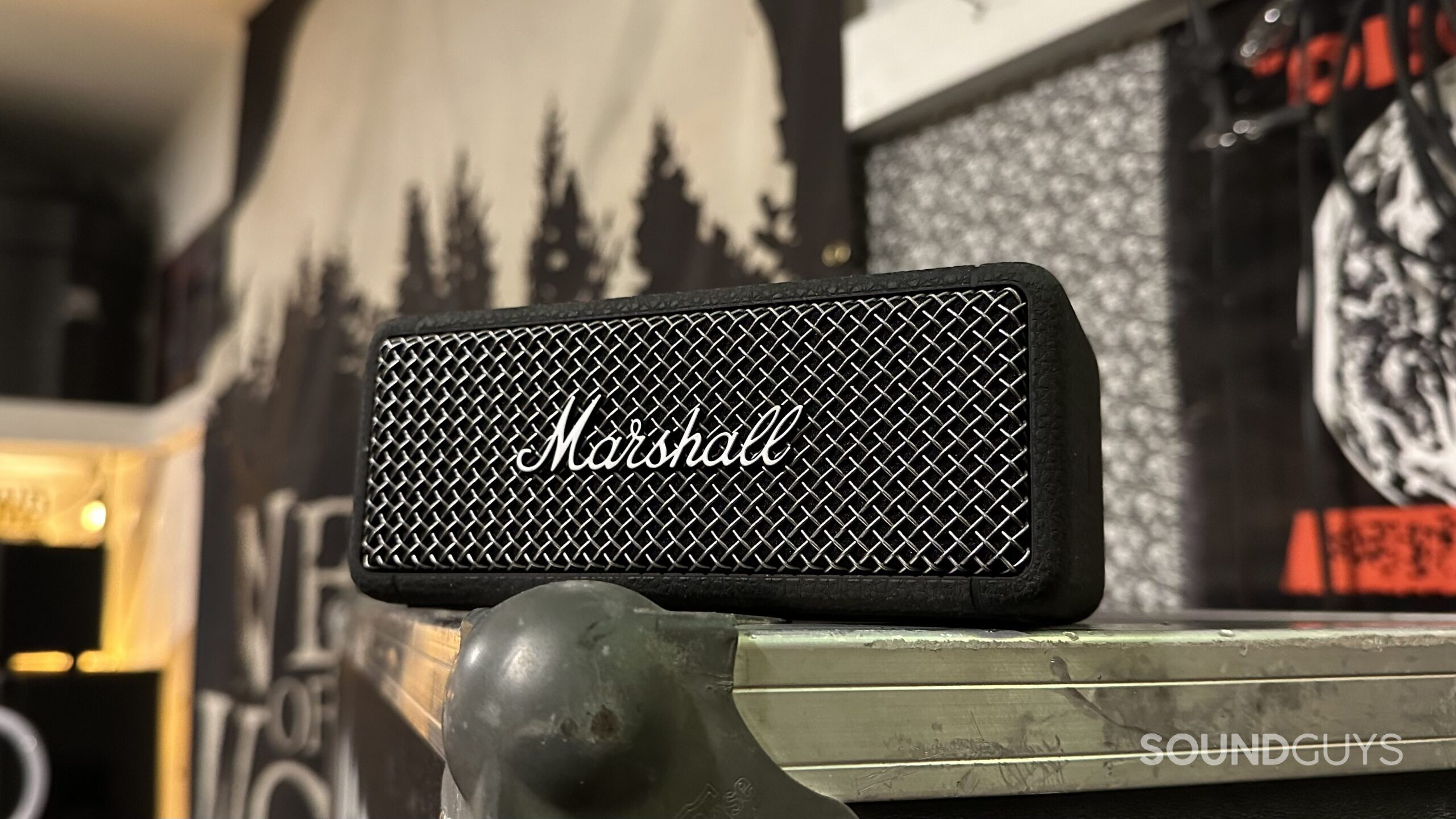 Marshall Emberton II hero A Marshall Emberton II Bluetooth speaker placed on a road case.