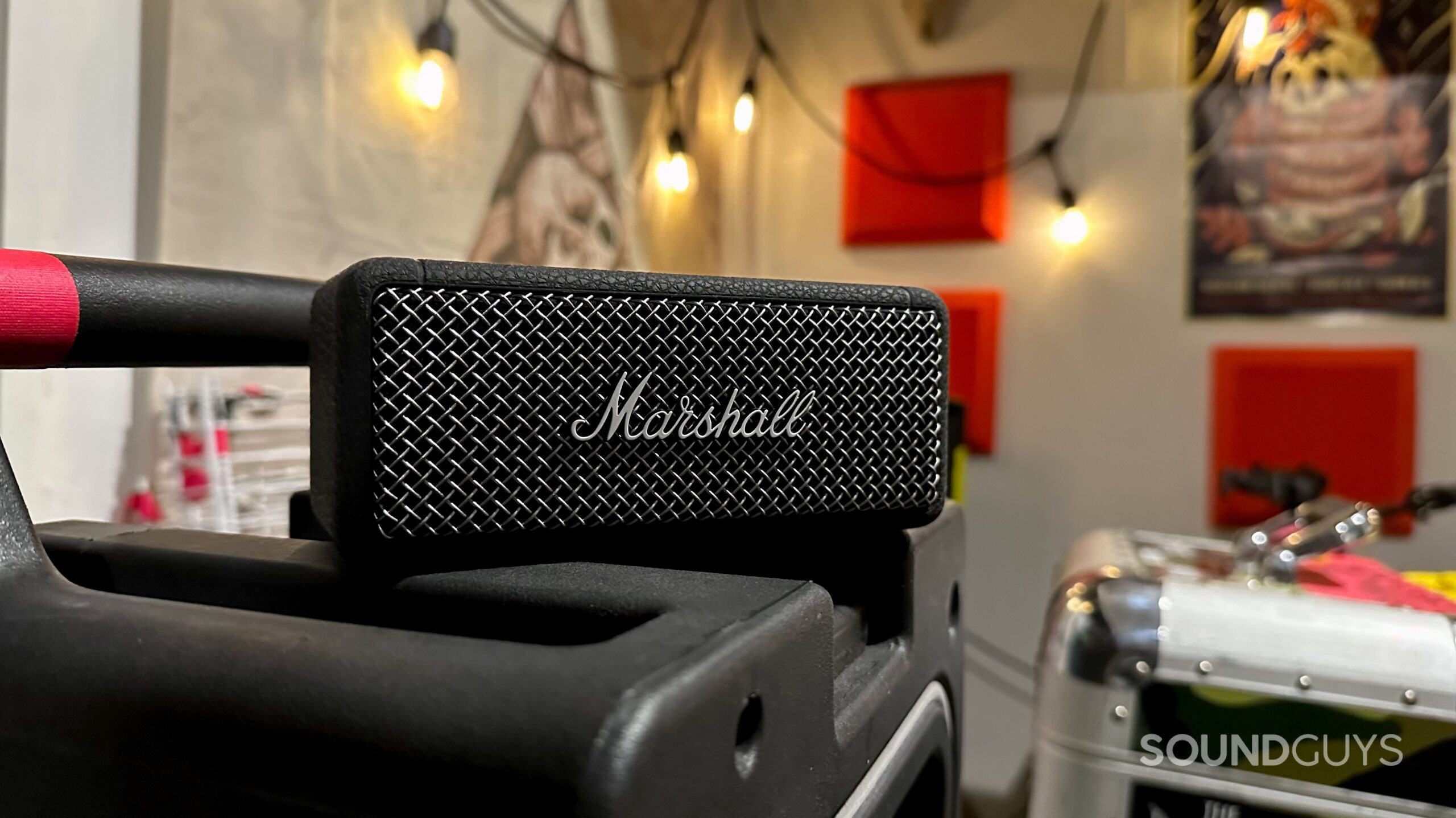 Marshall Emberton II on guitar case A Marshall Emberton II Bluetooth speaker placed on top of a road case.