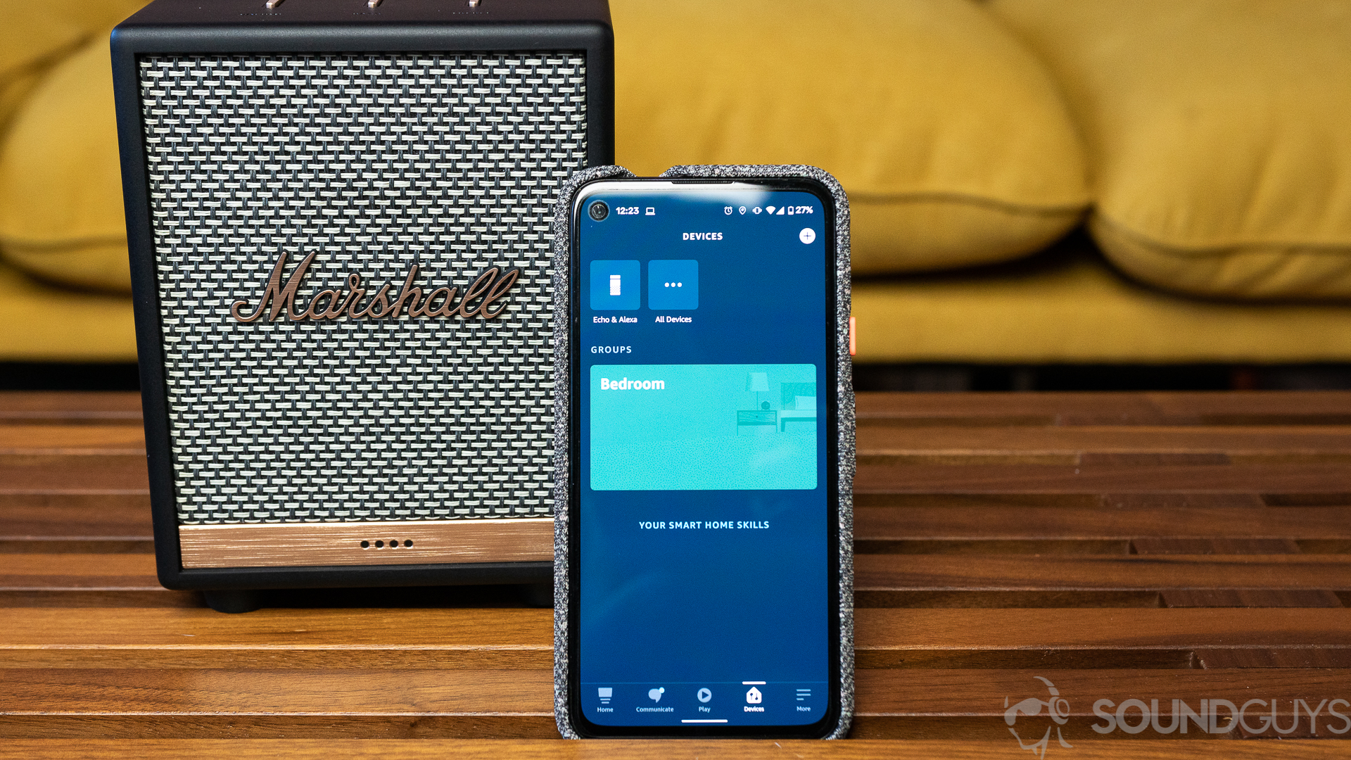 Marshall Uxbridge Voice Amazon Alexa app Amazon Alexa app open on the Google Pixel 4a with Marshall Uxbridge Voice behind it
