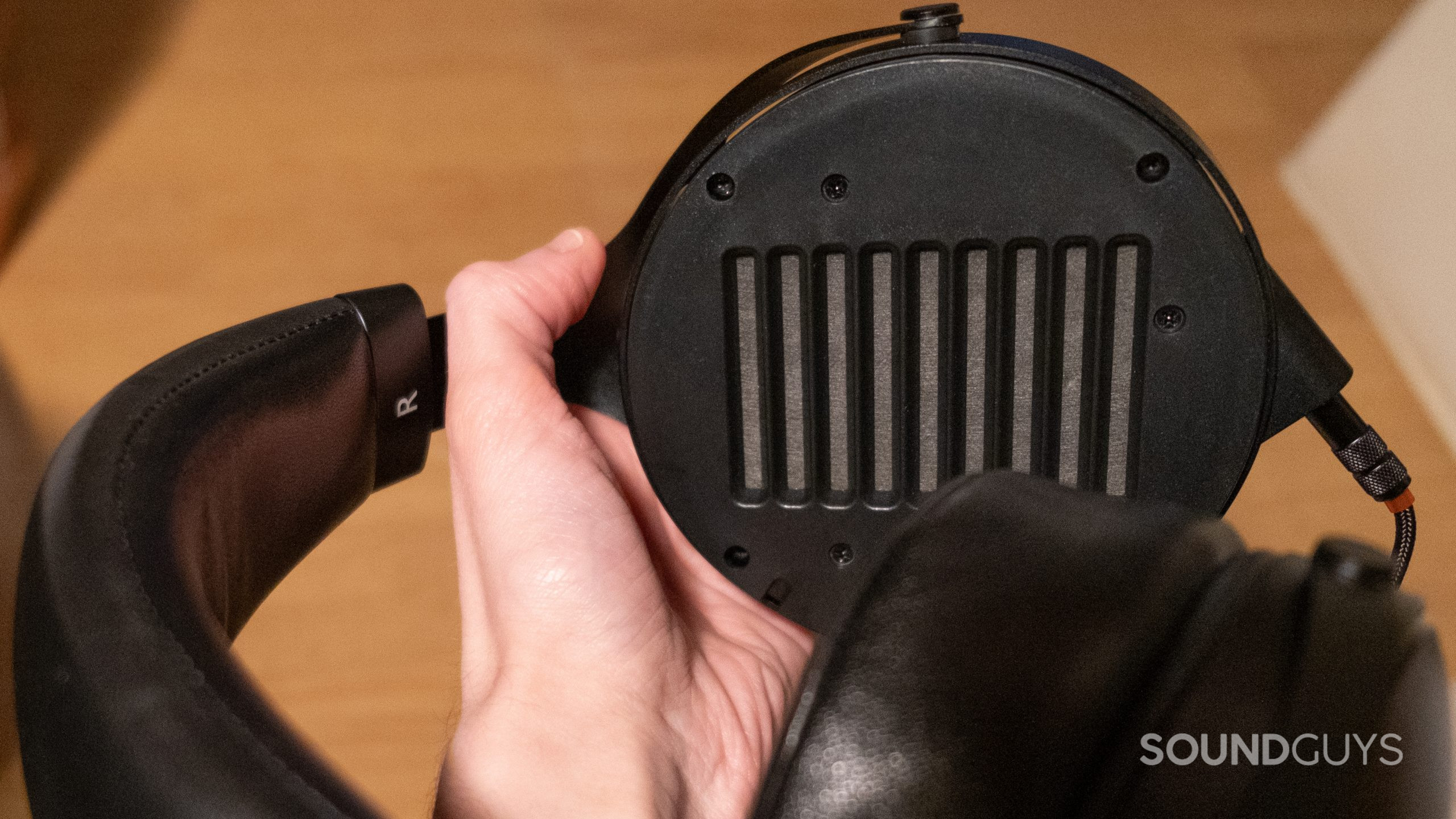 monolith-by-monoprice-m1070c-no-ear-pad A close up of the bare planar magnet grill visible of the Monolith by Monoprice M1070C.