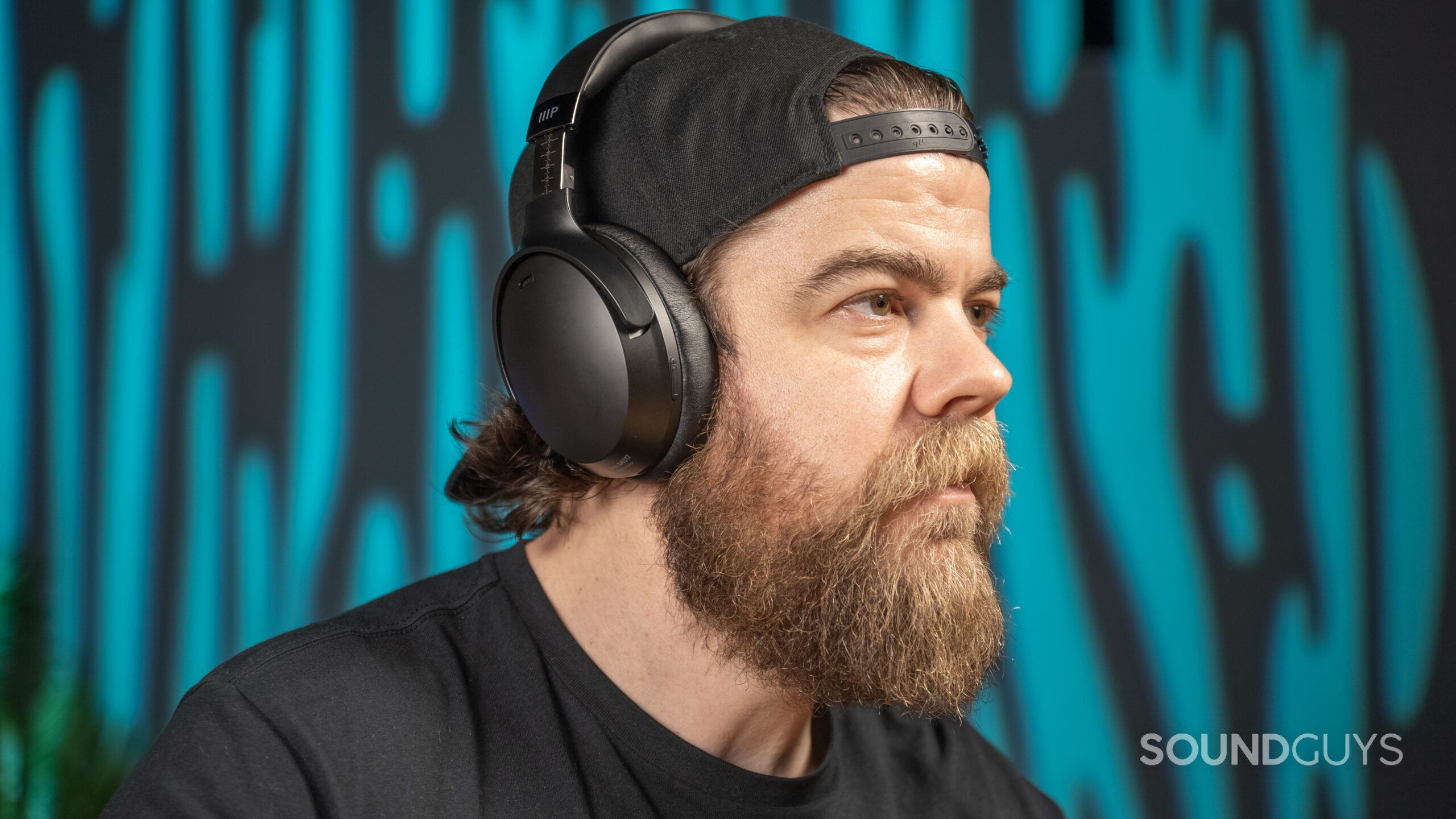 monoprice-dual-driver-bluetooth-headphones-guy-wearing The Monoprice Dual Driver Bluetooth Headphones worn by bearded individual