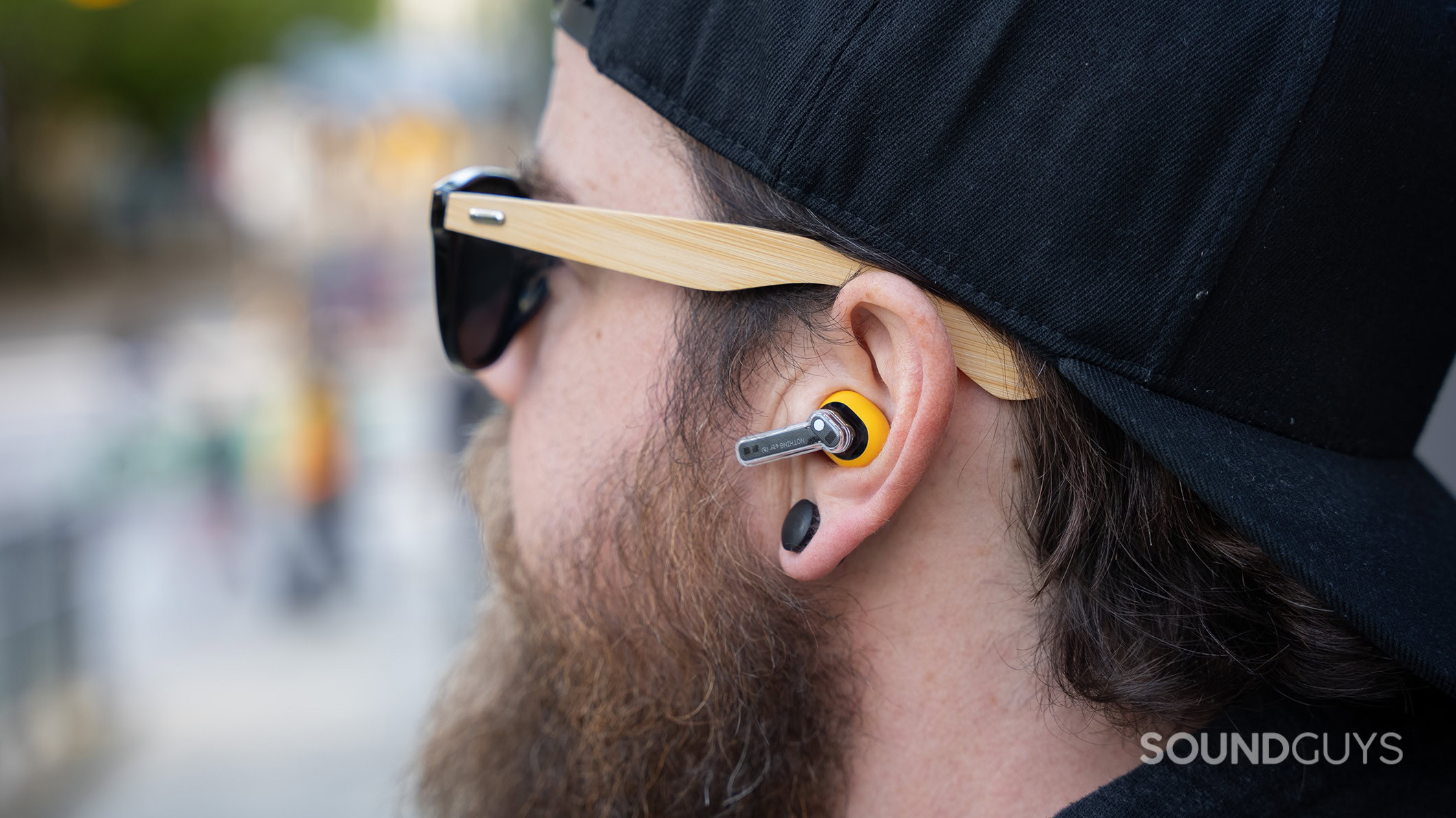 Nothing Ear (a) in ear 3 A man wearing the Nothing Ear (a).
