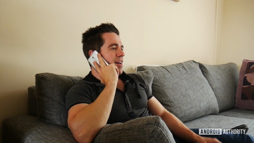 phone-call-840x472 A man uses a smartphone to make a phone call using his voice.