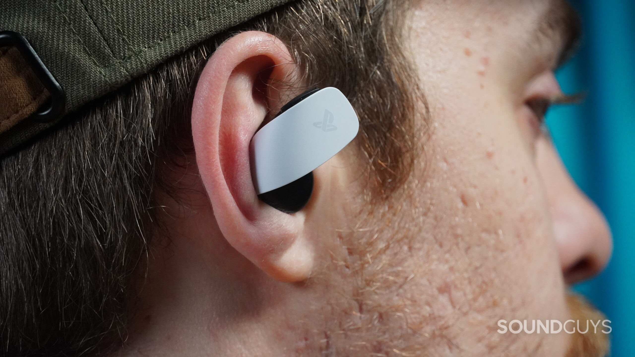 pulse explore earbuds in ear A man wears the Pulse Explore earbuds.