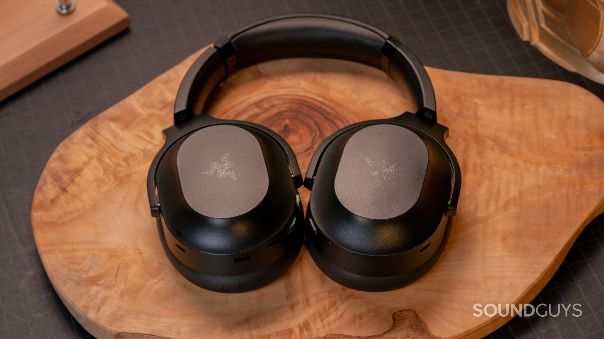 Razer Barracuda Pro flat tabletop The Razer Barracuda Pro laying flat on a wood surface.