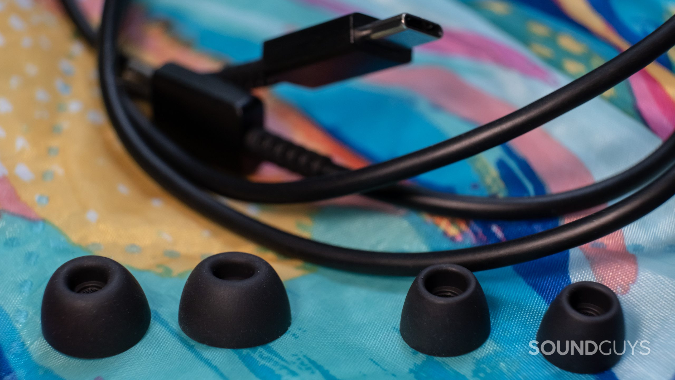 samsung-galaxy-buds-2-pro-accessories A close up shows the included extra two sets of ear tips and the USB-A to USB-C cable included with the Samsung Galaxy Buds 2 Pro.