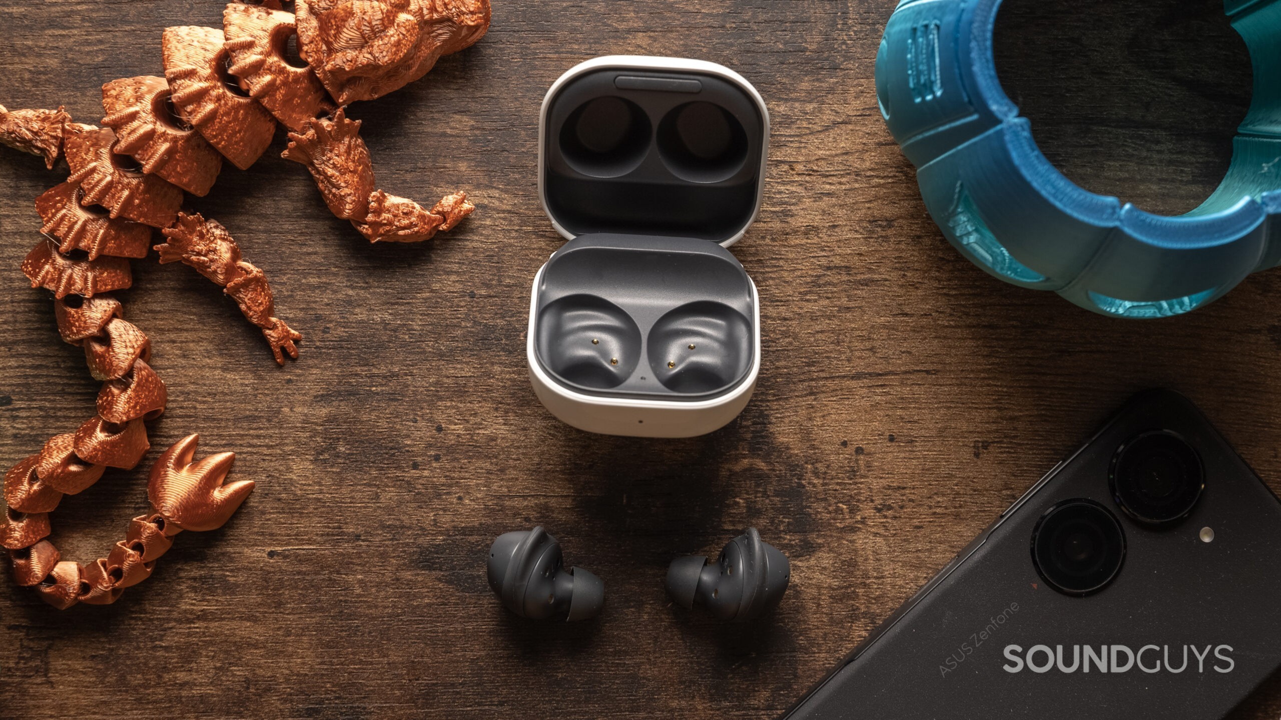 Samsung-Galaxy-Buds-FE-On-Table-Open-Case-Buds-Out The Samsung Galaxy Buds FE have a tiny charging case.