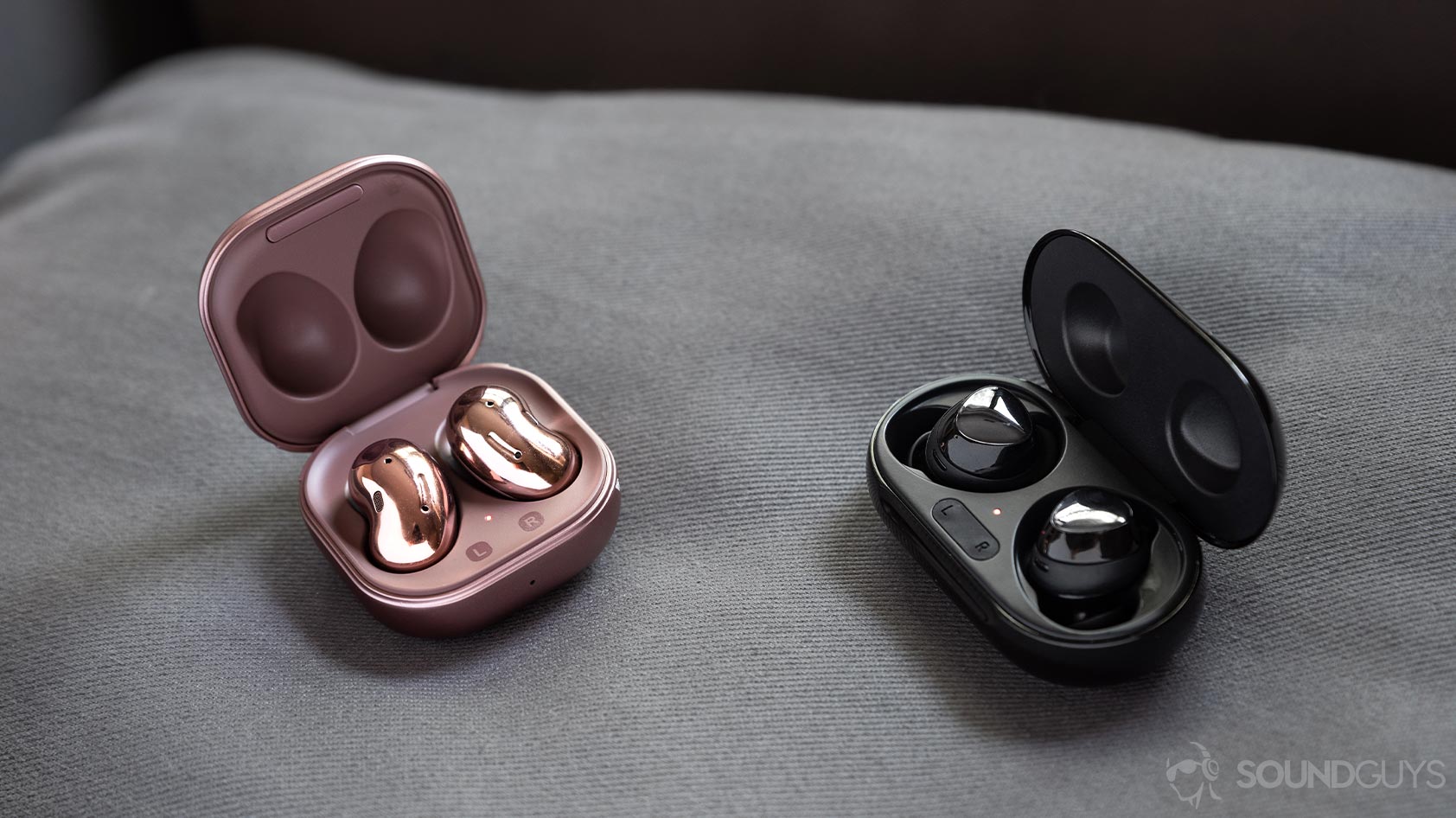 Samsung Galaxy Buds Plus vs Samsung Galaxy Buds Live-hero cases open A picture of the Samsung Galaxy Buds Plus vs Samsung Galaxy Buds Live case open comparison.