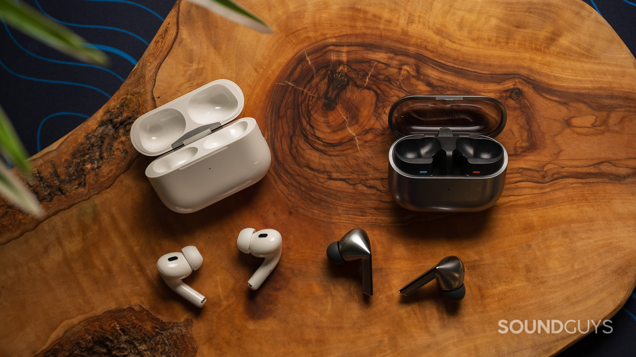 Samsung Galaxy Buds3 Pro vs Apple AirPods Pro (2nd generation) earbuds next to case The Samsung Galaxy Buds3 Pro on a table next to the Apple AirPods Pro 2.