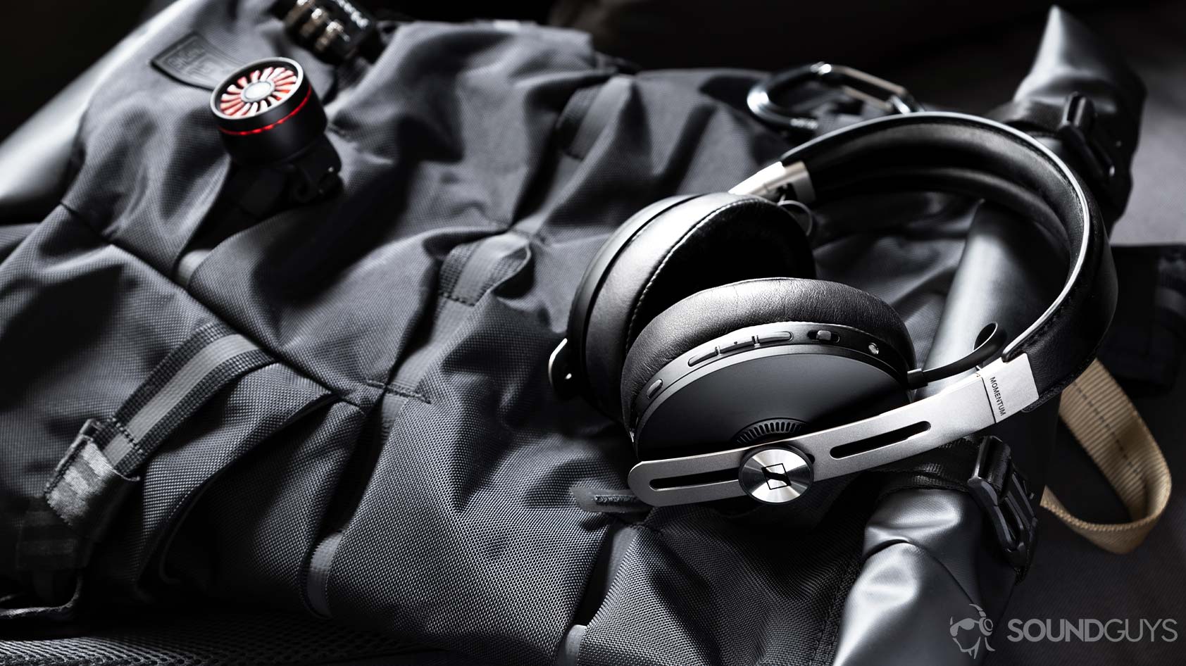 Sennheiser Momentum Wireless 3-3_headhones backpack The Sennheiser Momentum Wireless 3 headphones lying flat on a backpack.