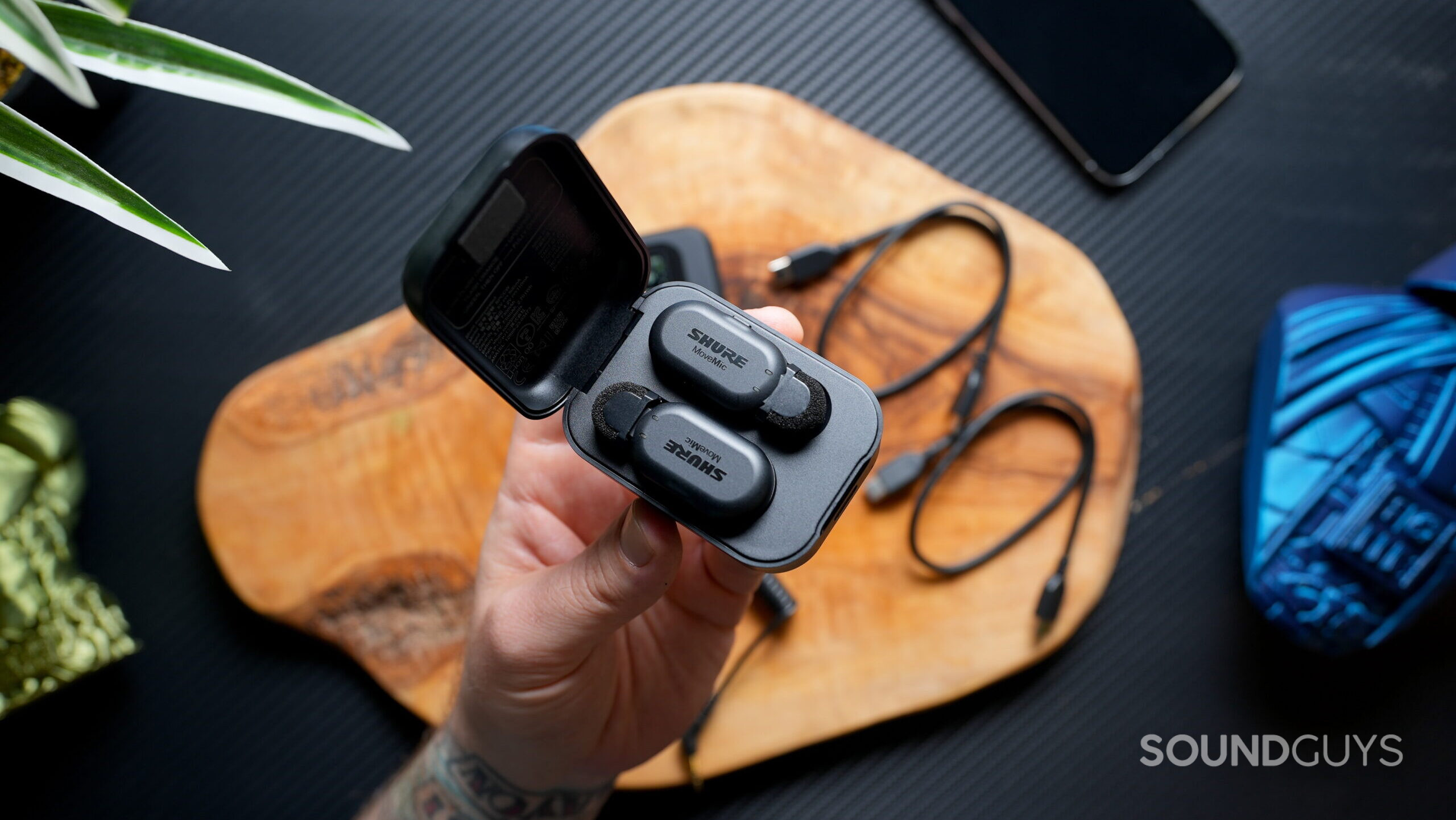 Shure MoveMic Transmitters in case Top view of the Shure MoveMic transmitters in their charging case