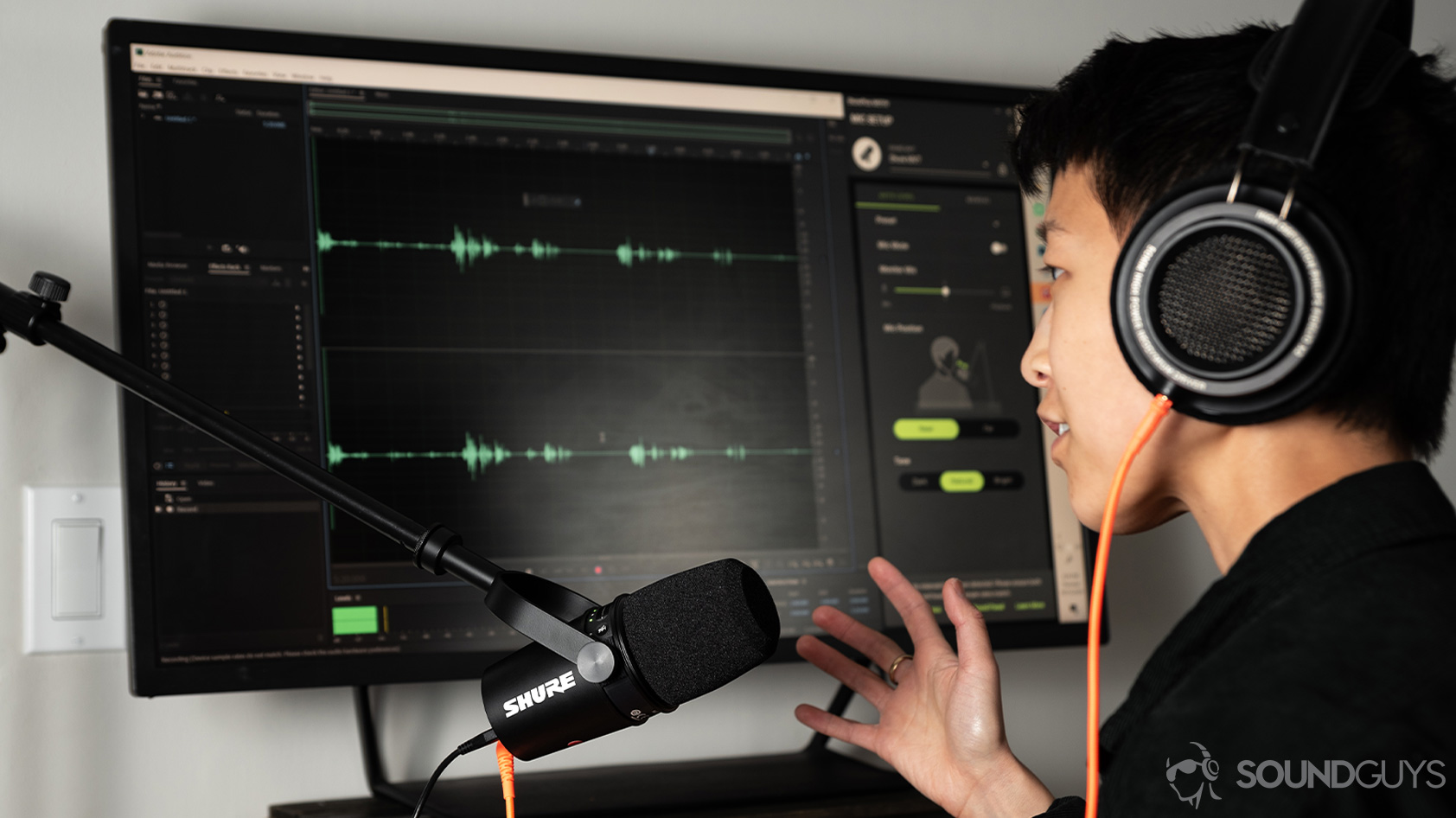 Shure MV7 USB microphone XLR woman speaks A woman speaks into the Shure MV7 USB microphone as it records into Adobe Audition.