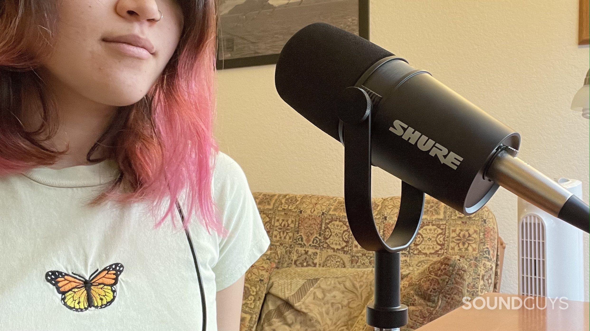 Shure MV7X 1 Woman using the Shure MV7X.