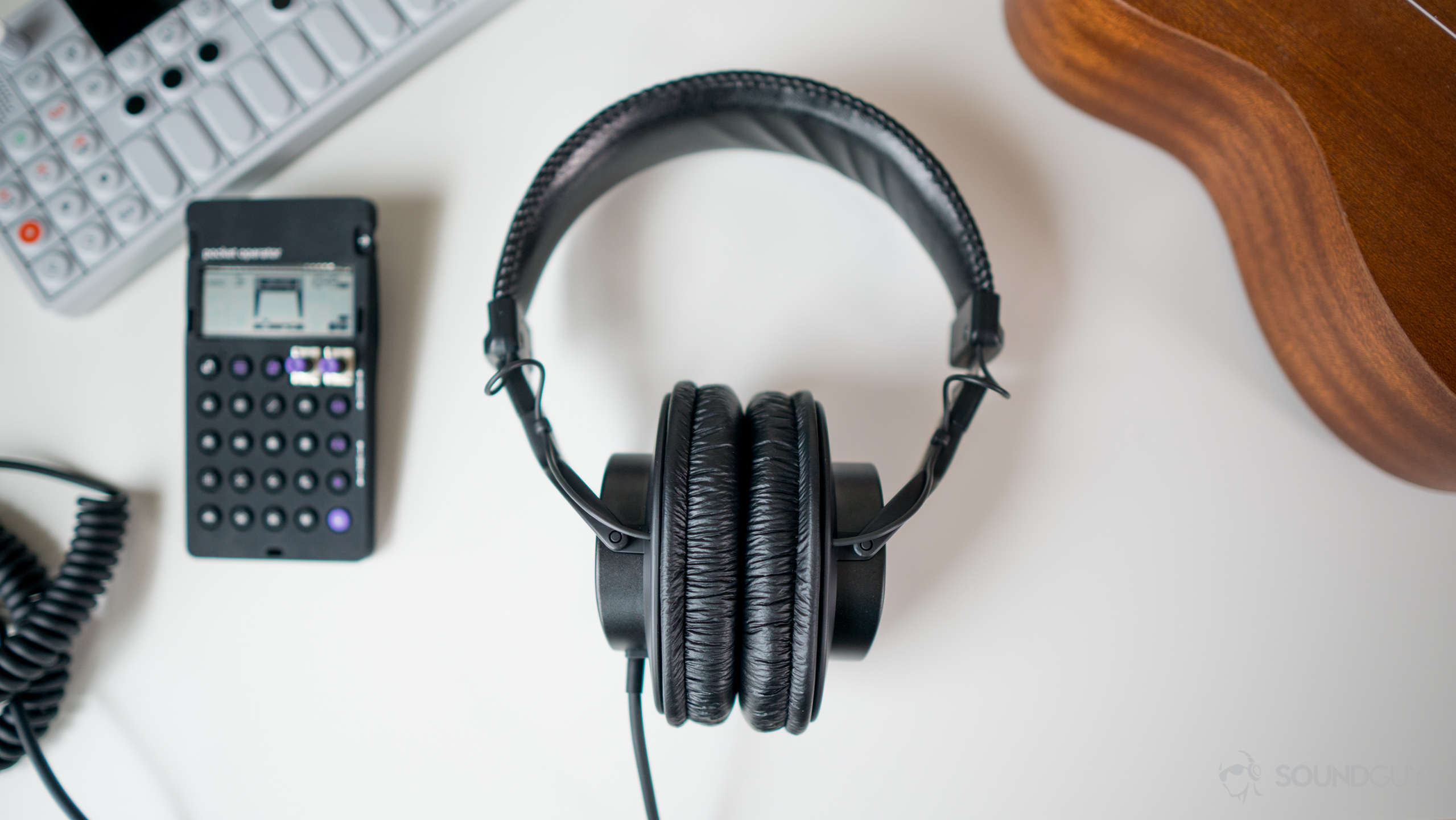 Sony MDR-7506-11 The Sony MDR-7506 headphones sitting next to some of my favorite instruments.
