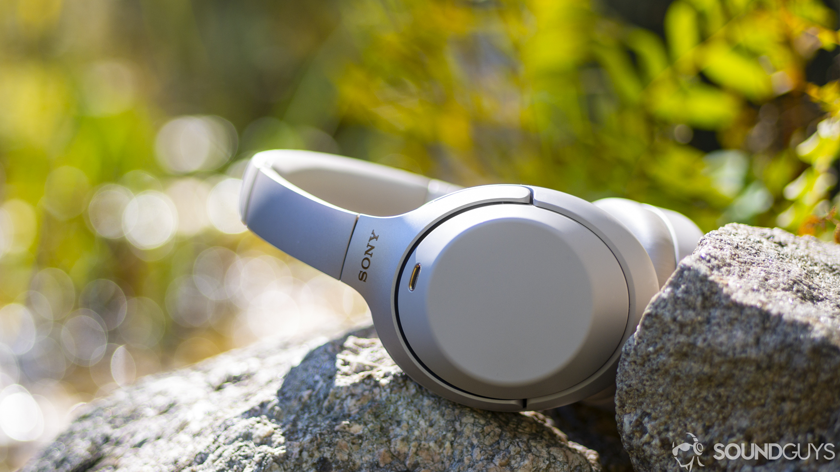 sony-wh-1000x-m3-hero A photo of the Sony WH-1000XM3 sitting on a stone wall.