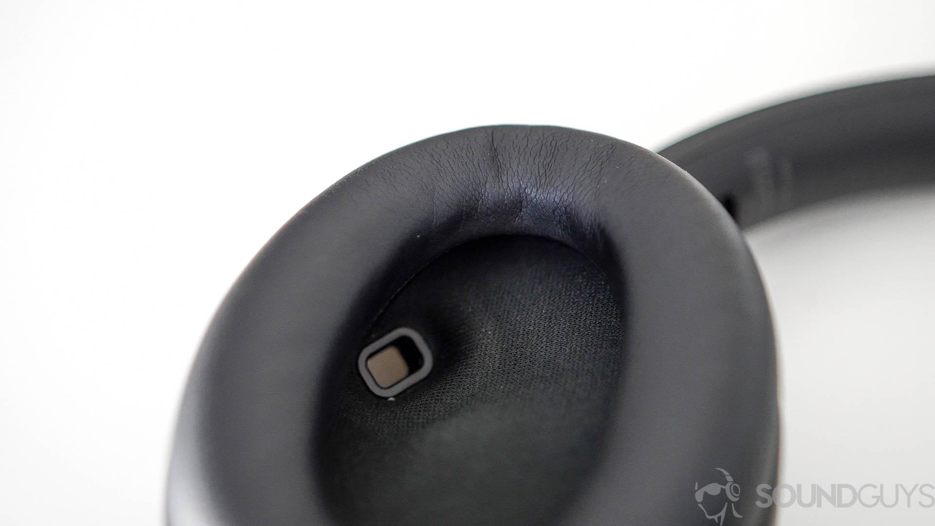 Sony WH-1000XM4 proximity sensor Close-up of the proximity sensor on the inside of the left earcup of the Sony WH-1000XM4 headphones.