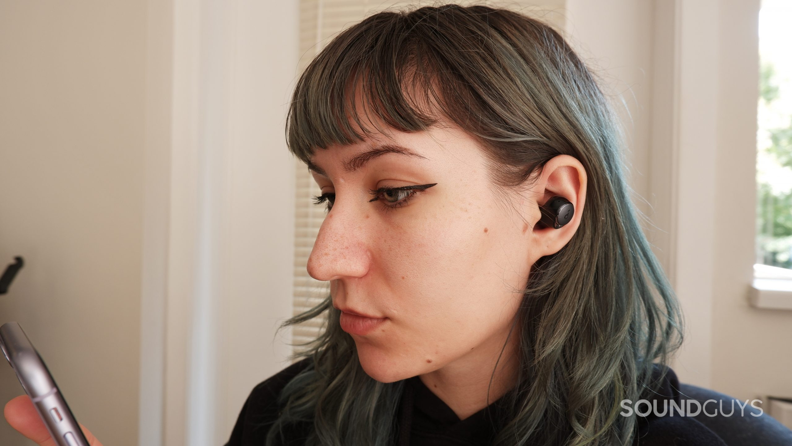 space-a40-in-ears The Anker Soundcore Space A40 in a person's ears.
