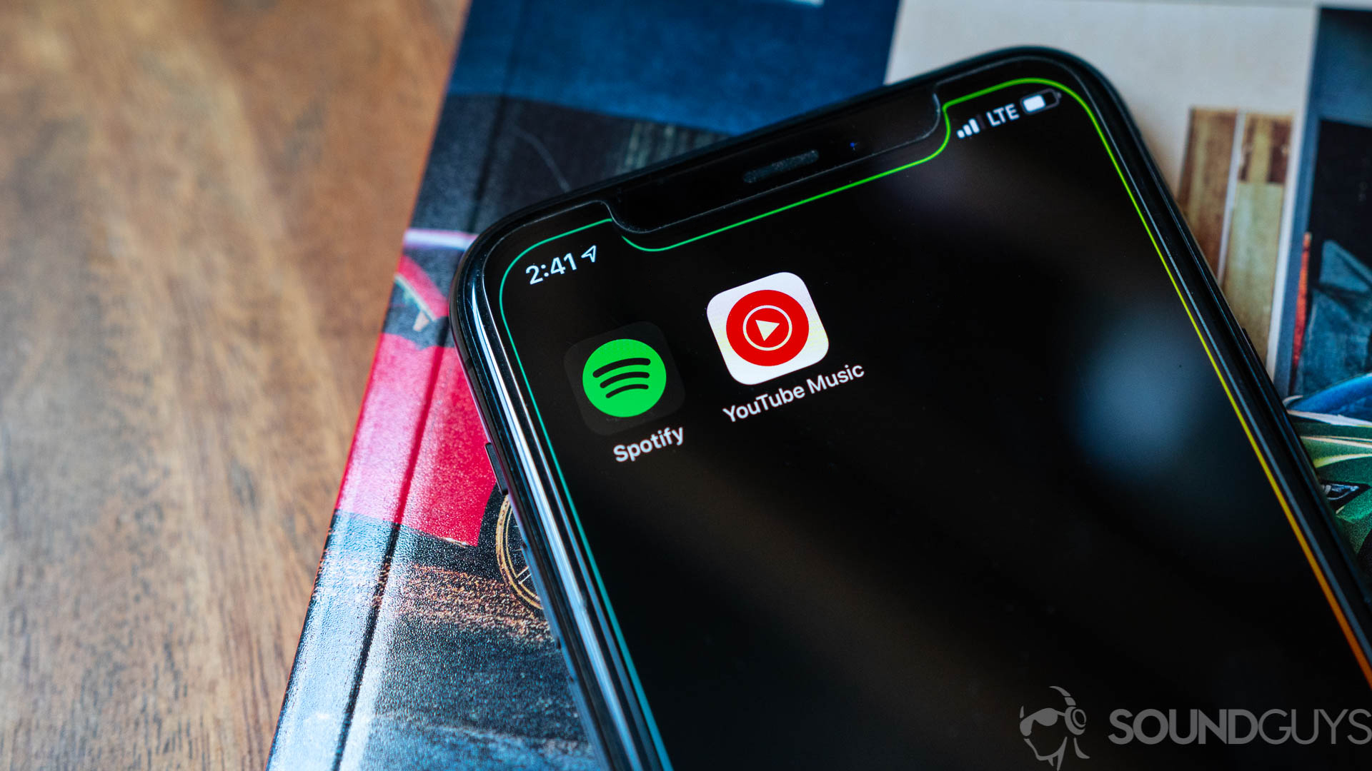 Spotify vs YouTube Music app icons Close-up shot of the YouTube Music and Spotify appi icons on iPhone