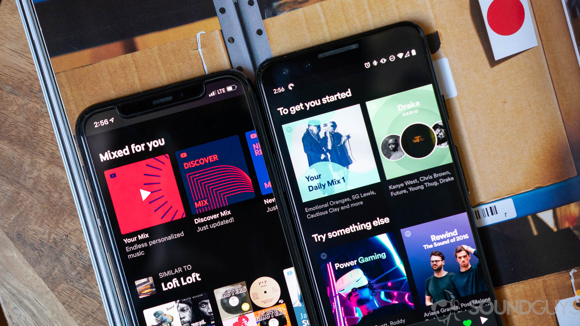 Spotify vs YouTube Music playlist recommendations Close-up shot of the recommended playlists on Spotify and YouTube Music on two phones on a magazine