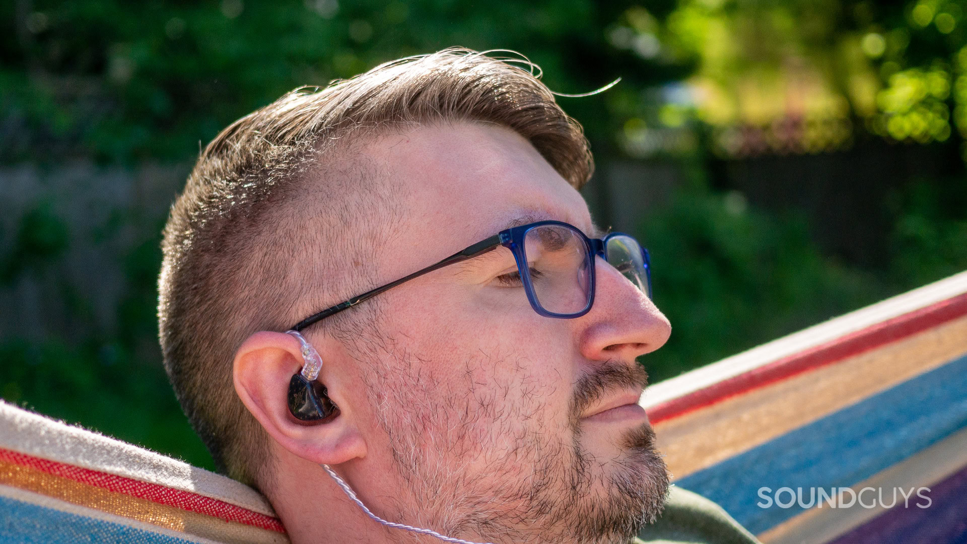 Tangzu-Waner-sg-wear A photo of a man in a hammock listening to the Tangzu Wan'er S.G.