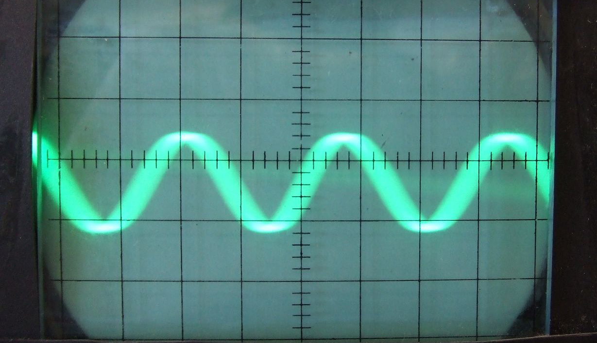 oscilloscope-example A photo of an oscilloscope readout with a sine wave.